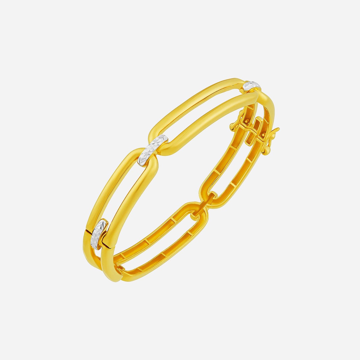 bangle in 22k yellow and white gold featuring open bars and diamond accents for a modern, elegant design.