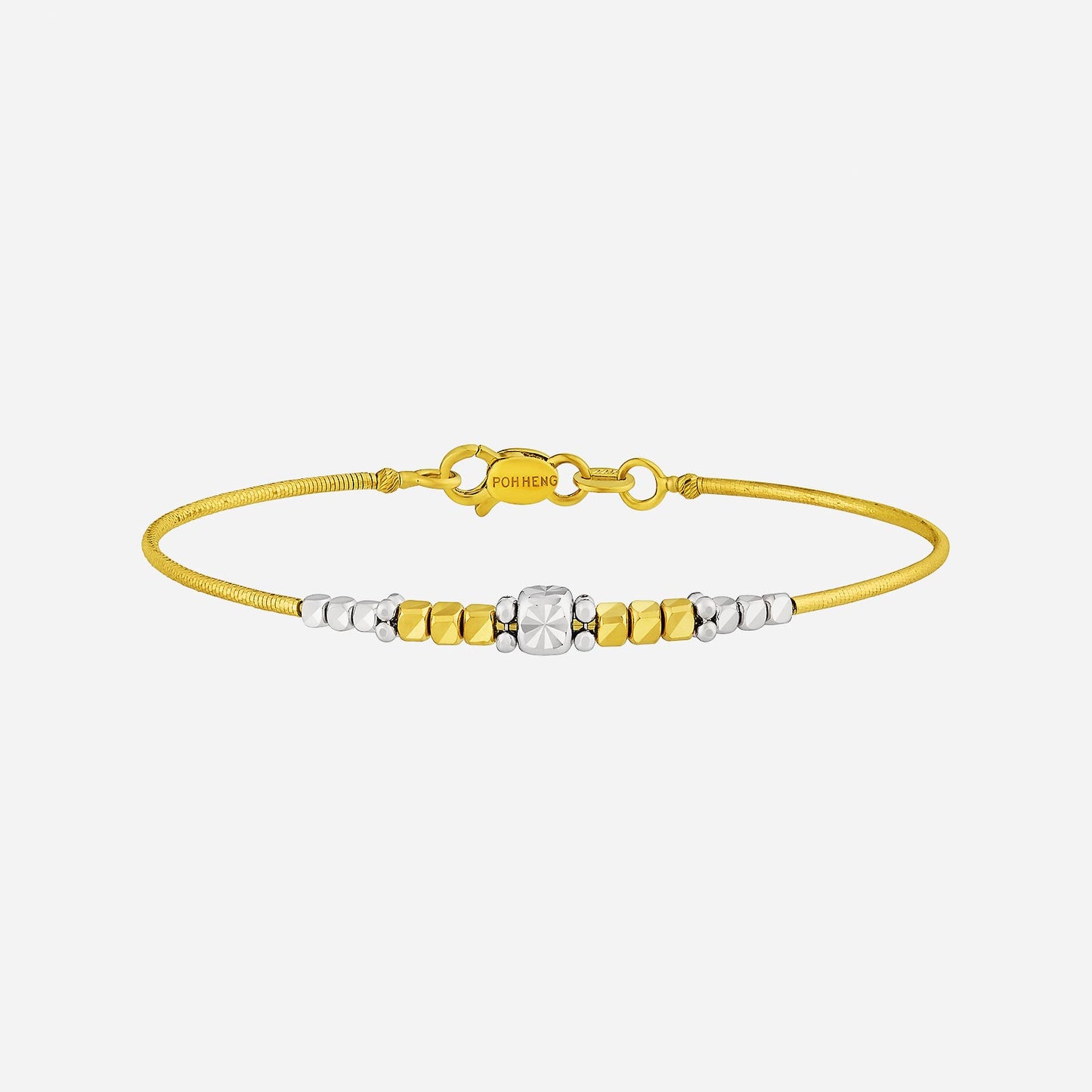 celestial whispers bangle in 22k yellow and white gold with faceted beads in golden and silvery tones.