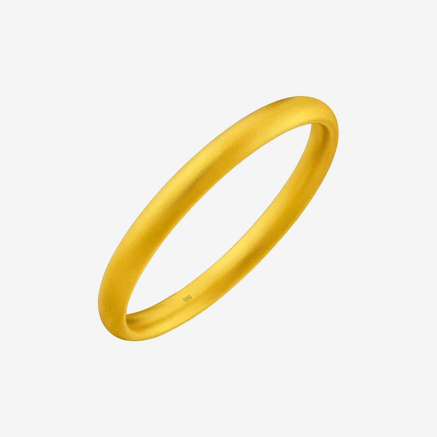 24k yellow gold bangle with a smooth matte finish, showcasing minimalist design and elegant simplicity.
