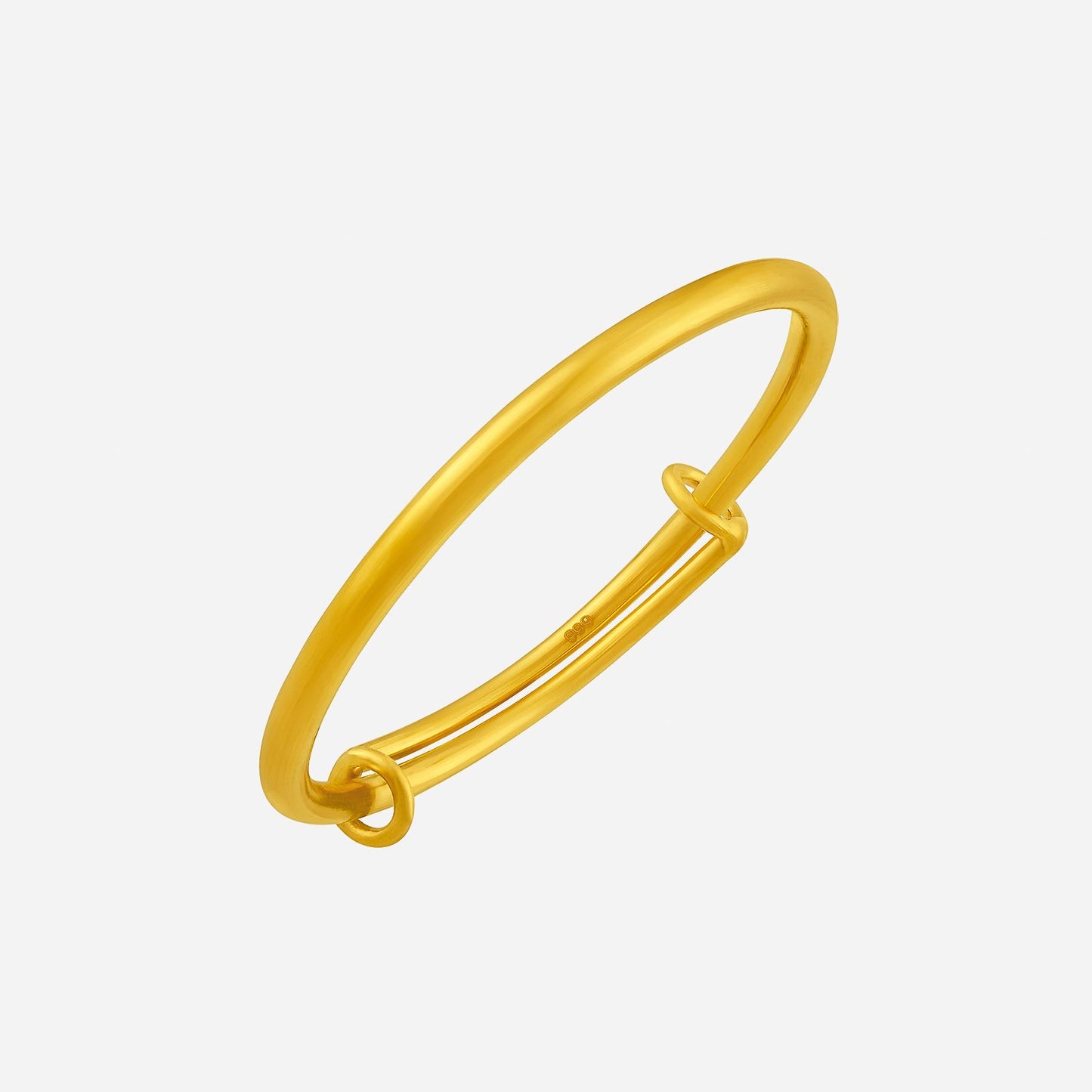24k yellow gold baby bangle with a smooth finish and a simple design, perfect for little ones.