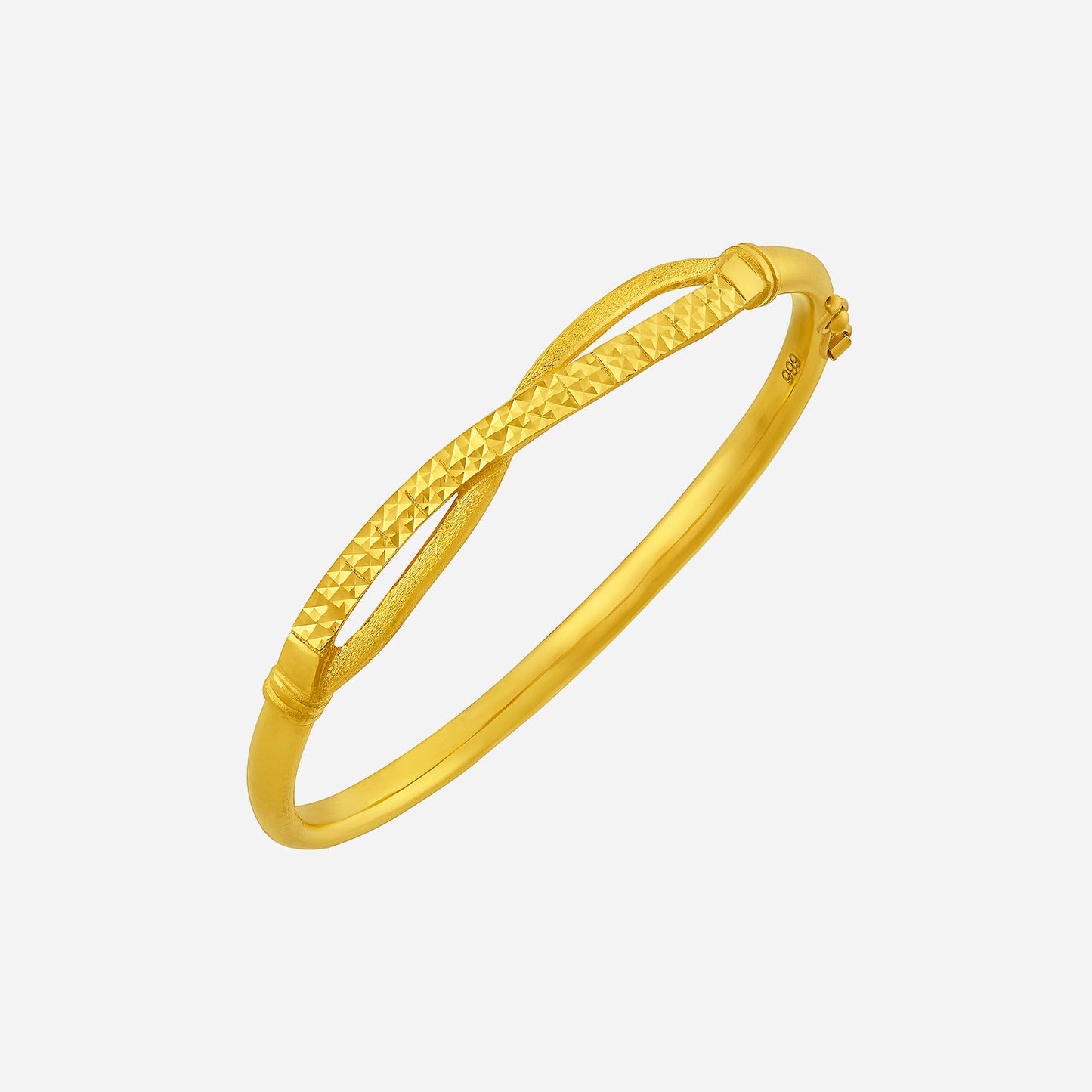 yellow gold bangle with intricate textured design and smooth polished finish, perfect for elegant occasions.