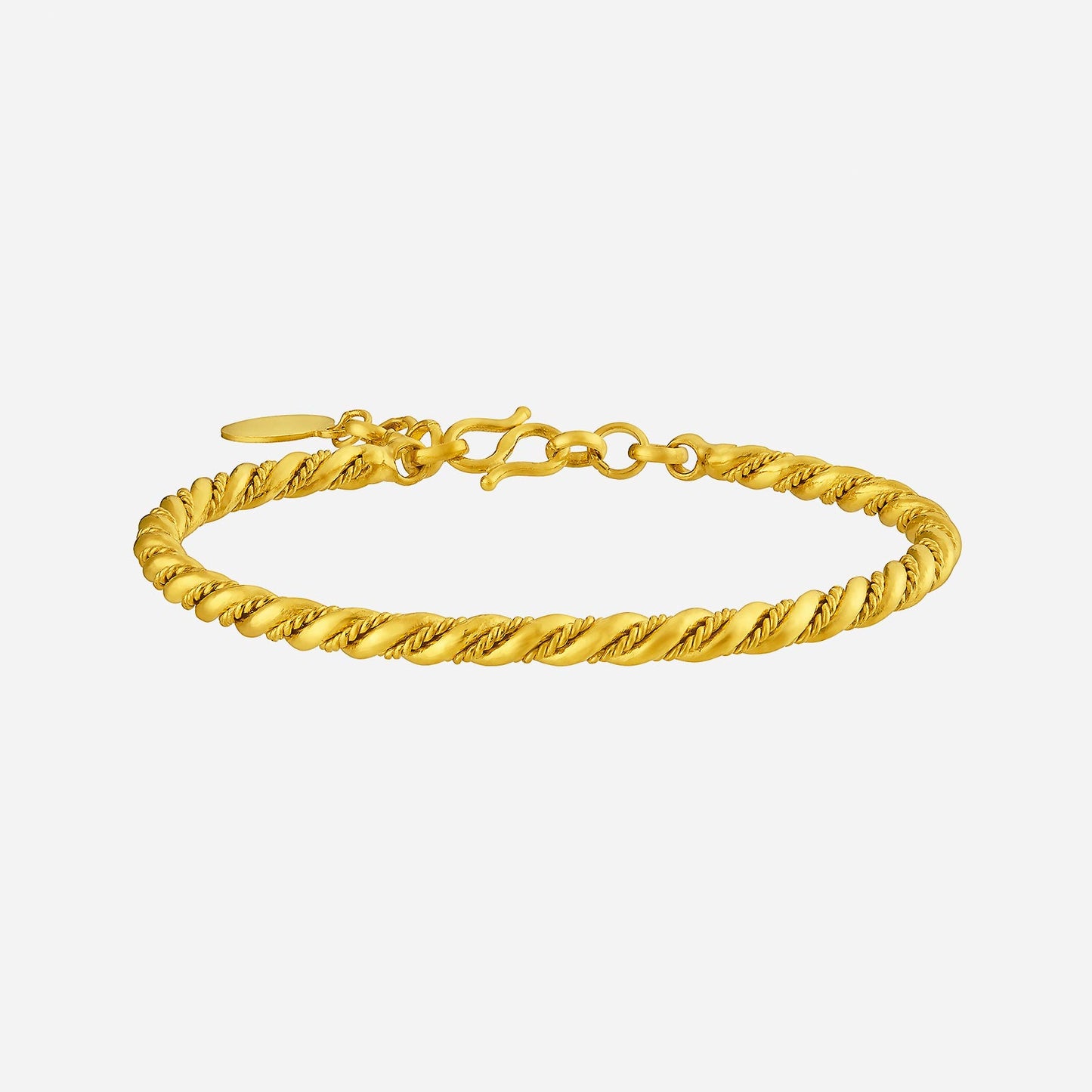 24k yellow gold bangle with twisted design, featuring a secure clasp for a stylish and elegant look.
