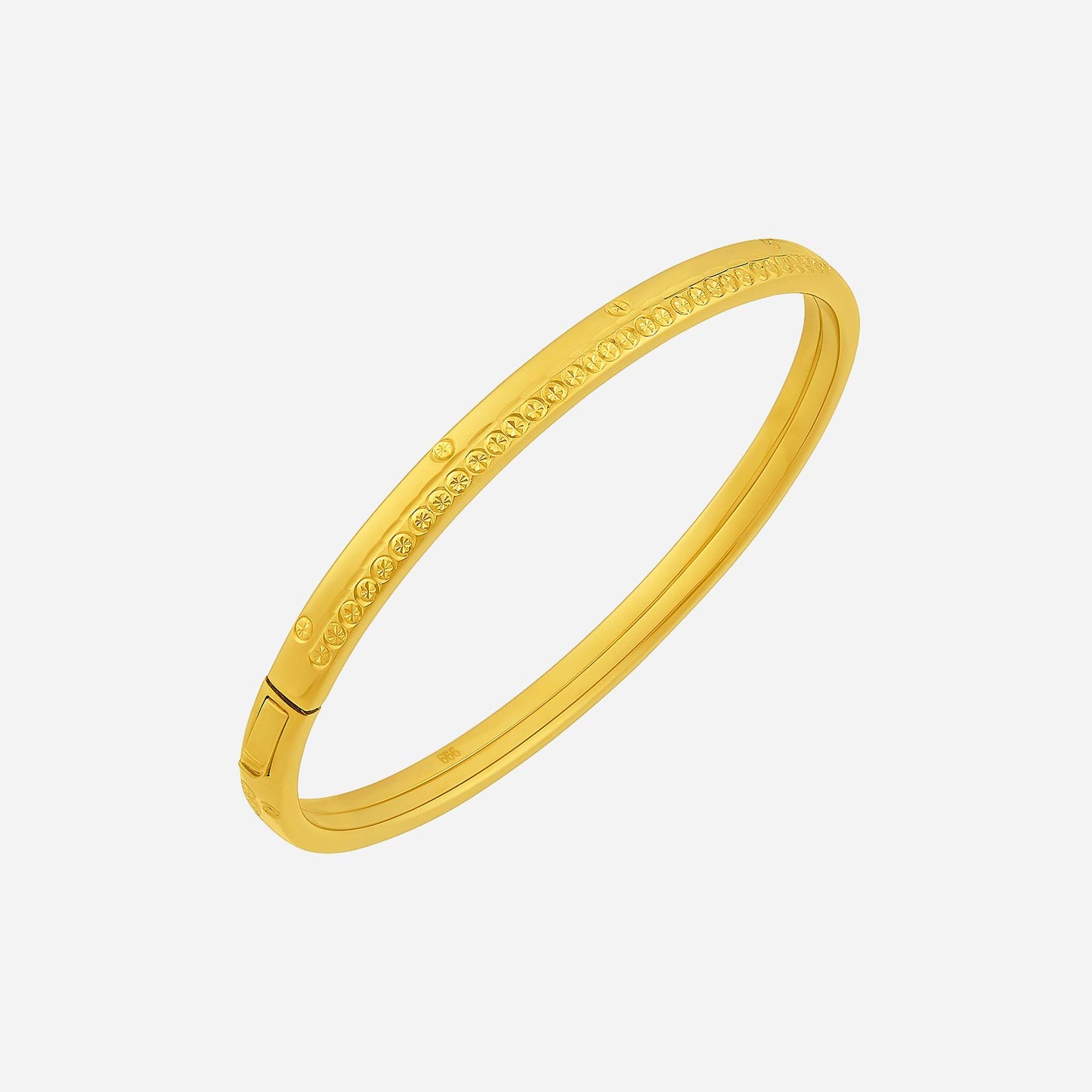 radiant bangle in 24k yellow gold with intricate detailing, perfect for everyday elegance or special occasions.
