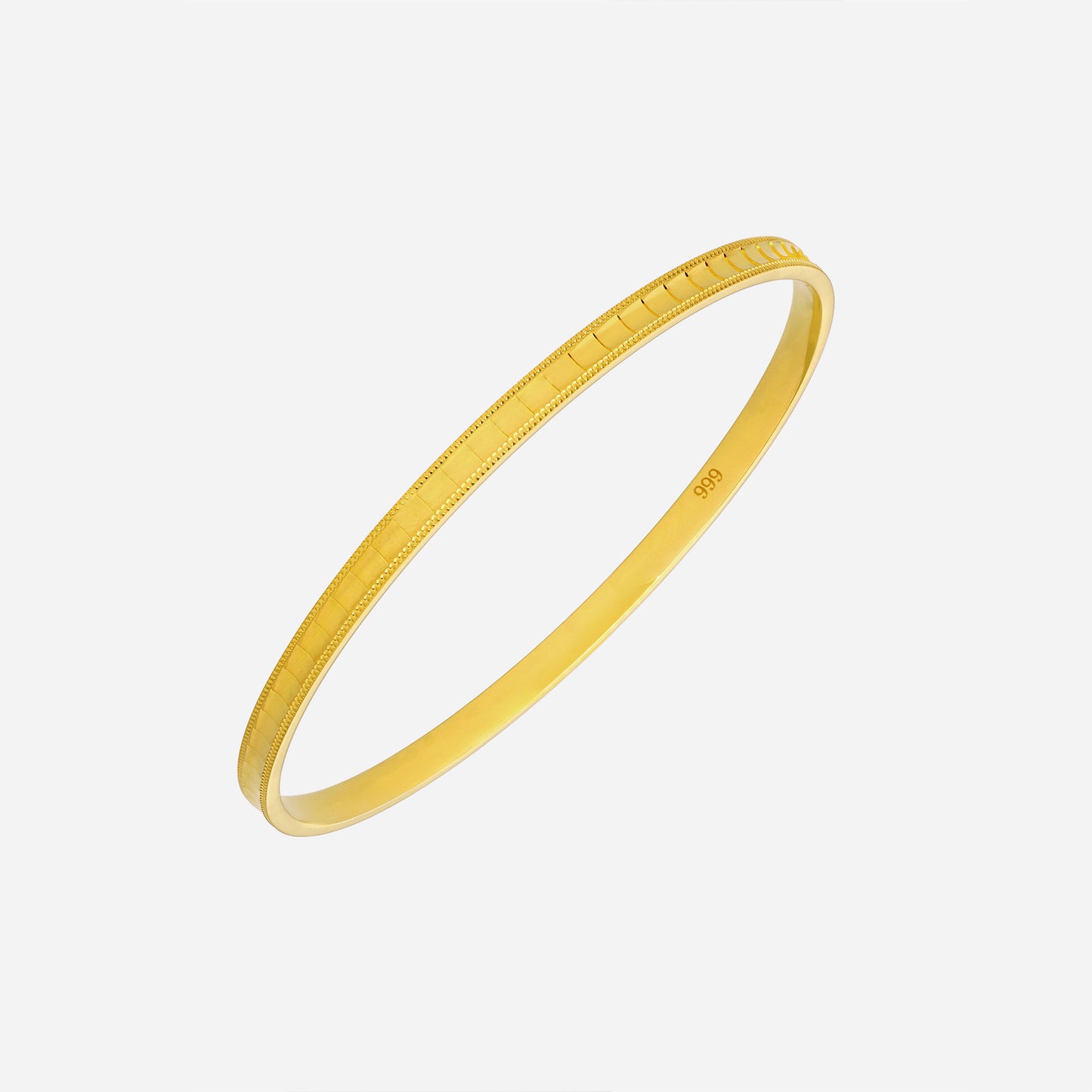 aurora bangle in 24k yellow gold with linear detailing, showcasing a sleek and minimalist design.