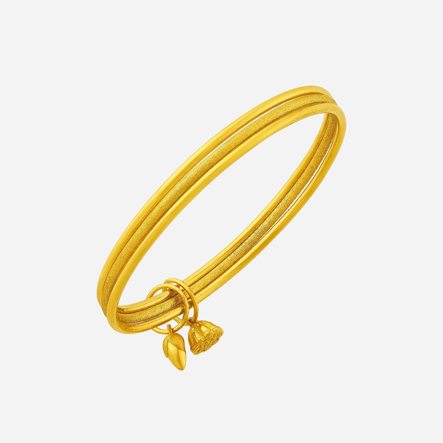 lustrous 24k yellow gold bangle with three polished bands and delicate golden charms in a structured design.