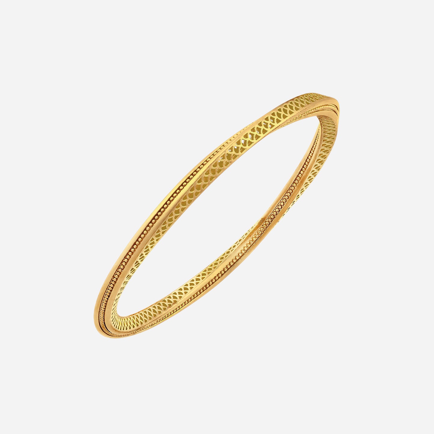 twisted bangle in 24k yellow gold with interlacing textures for a sophisticated, elegant look.
