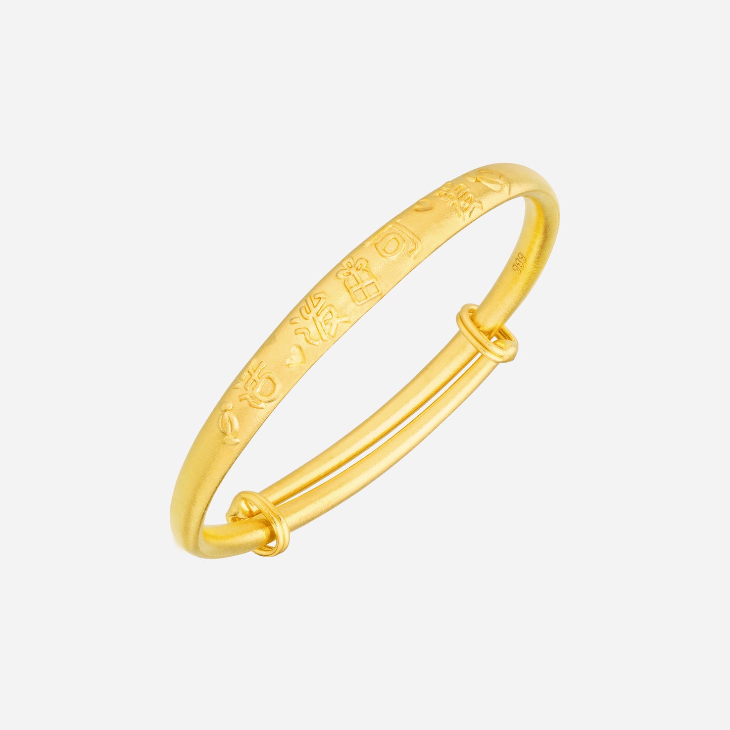 24k yellow gold baby bangle featuring delicate engravings symbolizing protection and good fortune.