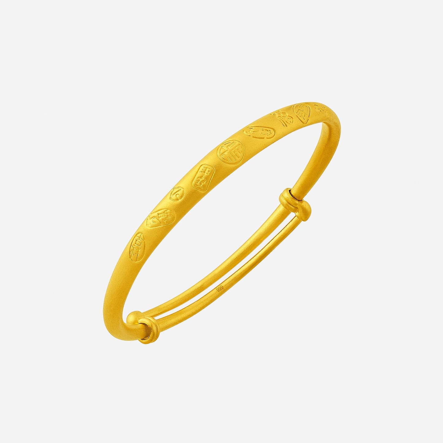 auspicious 24k yellow gold baby bangle with engraved blessings and smooth contours for protection and prosperity.