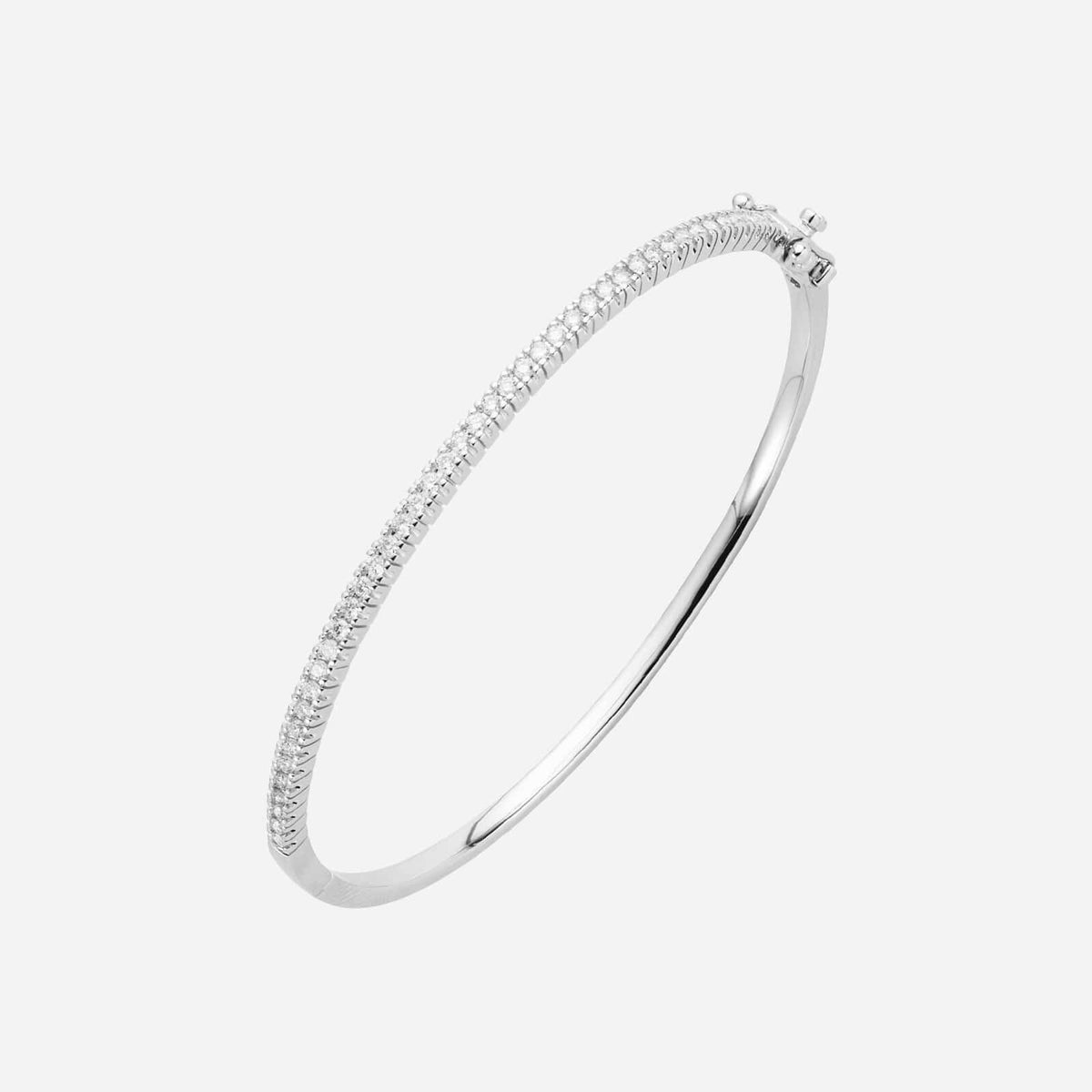 constellation bangle in 18k white gold featuring pear-shaped diamonds for a minimalist and elegant design.