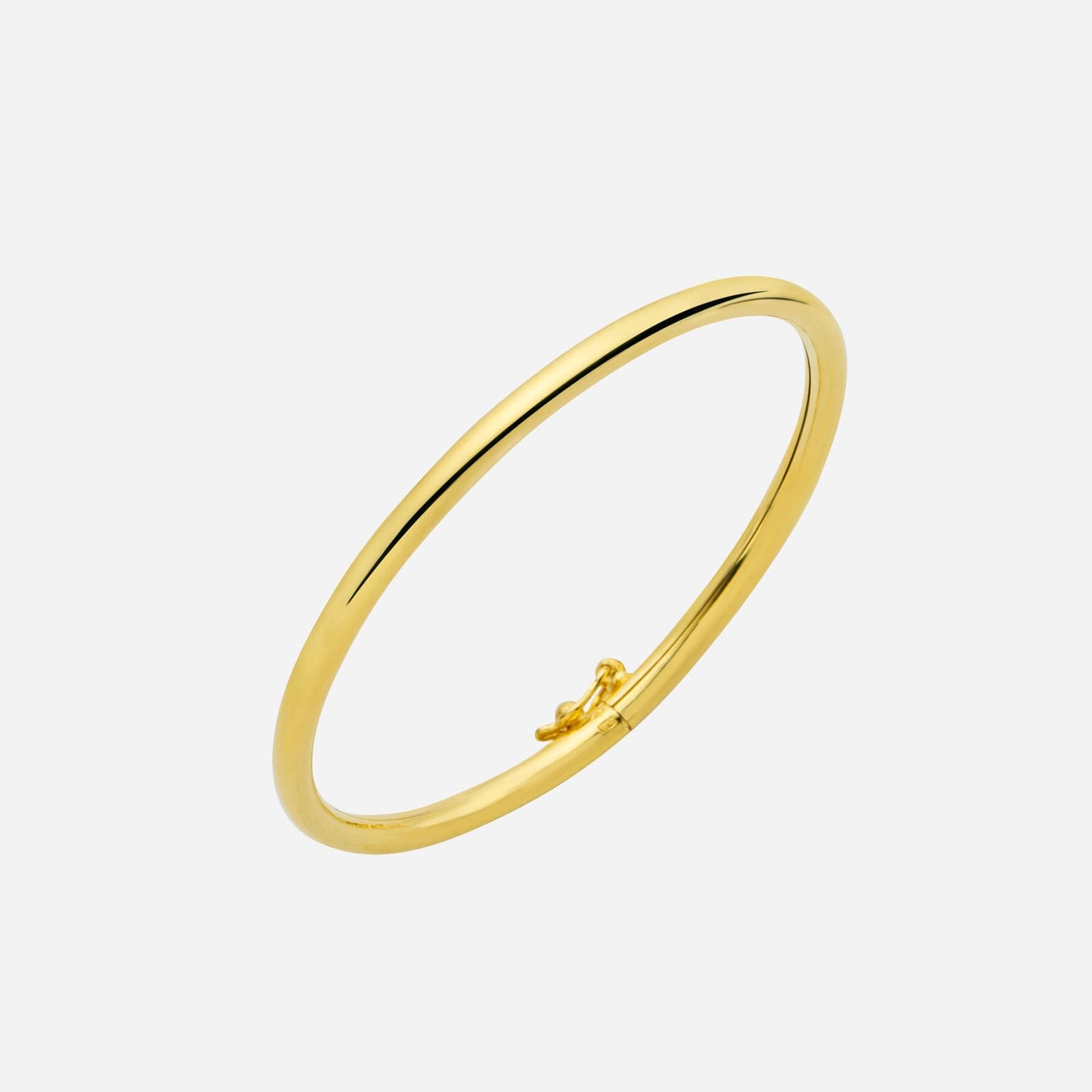 minimalist tube bangle in 22k yellow gold with a sleek and simple design, perfect for stacking or wearing alone.