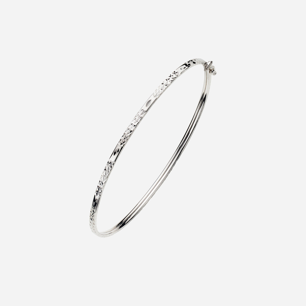 criss cross bangle in 18k white gold with an elegant etched design for a sophisticated look.