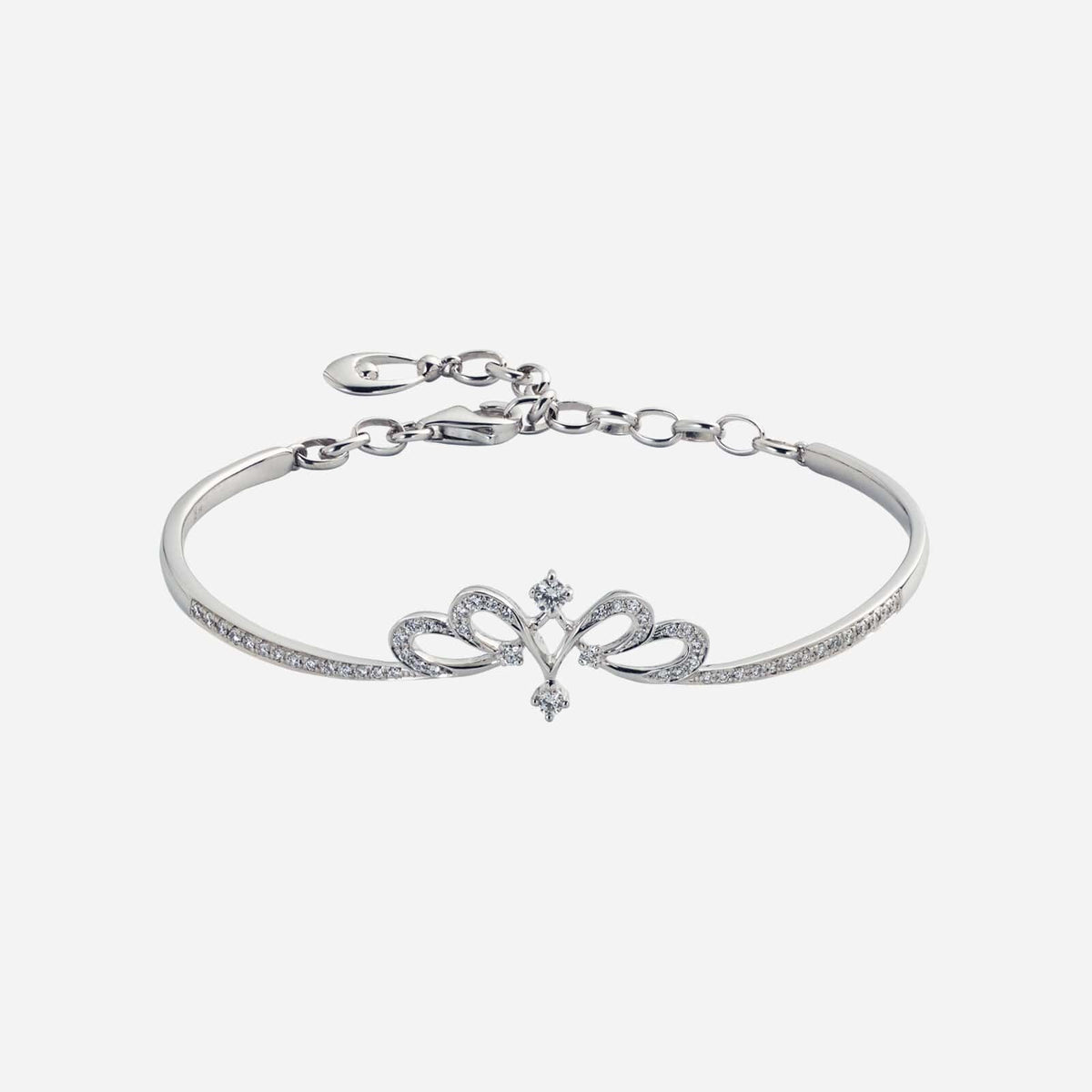 tiara love diamond bangle in 18k white gold featuring a feather design adorned with sparkling diamonds.
