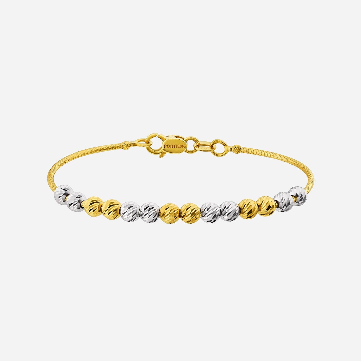 beaded bangle in 22k yellow and white gold with a textured design and clasp closure. perfect for layering.