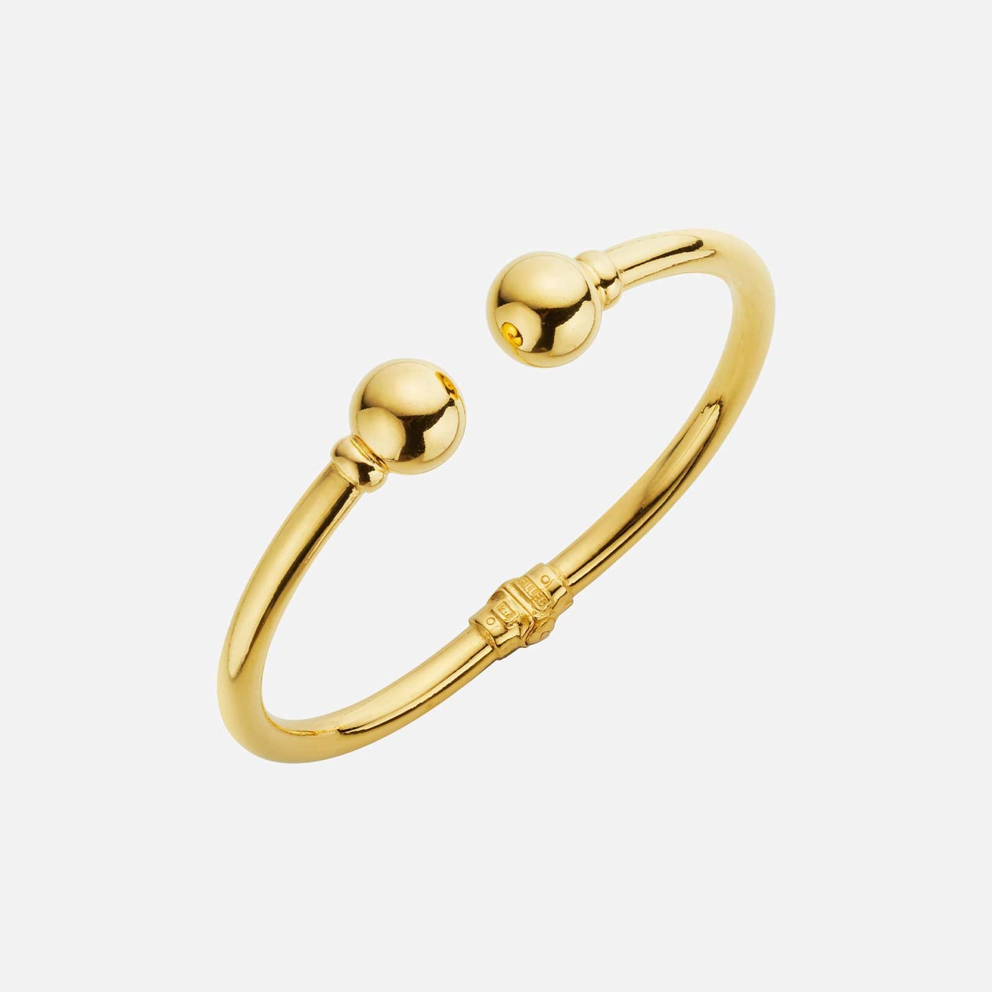 modern cuff bangle in 22k yellow gold featuring smooth, rounded ends and a sleek, minimalist design.