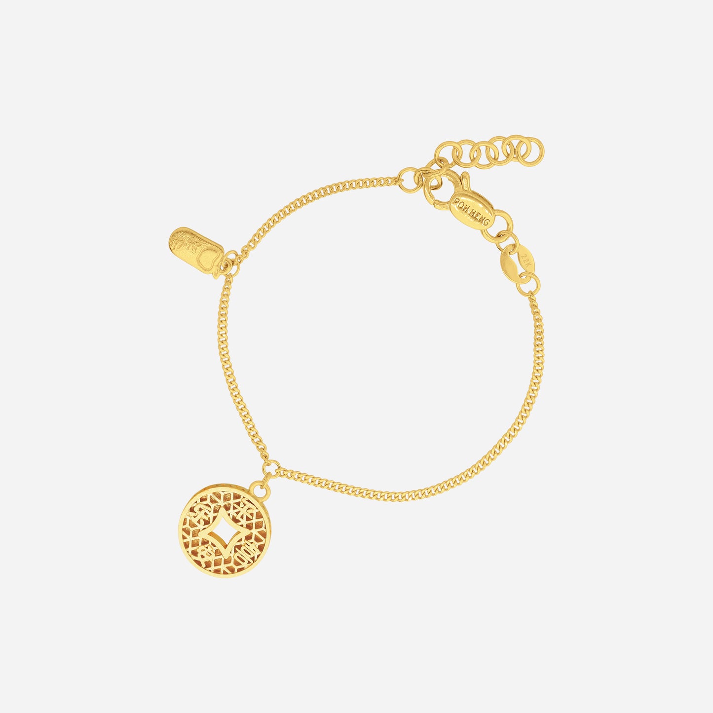 joyful baby bracelet in 22k yellow gold featuring a fine chain and small auspicious charm for little wrists.