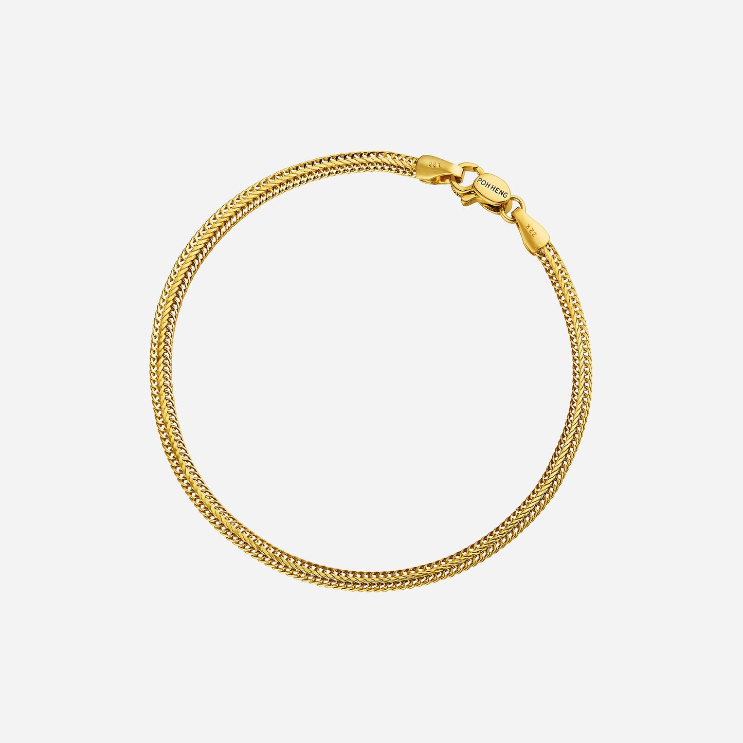 flat fox tail bracelet in 22k yellow gold, featuring a sleek braided design suitable for casual or work attire.