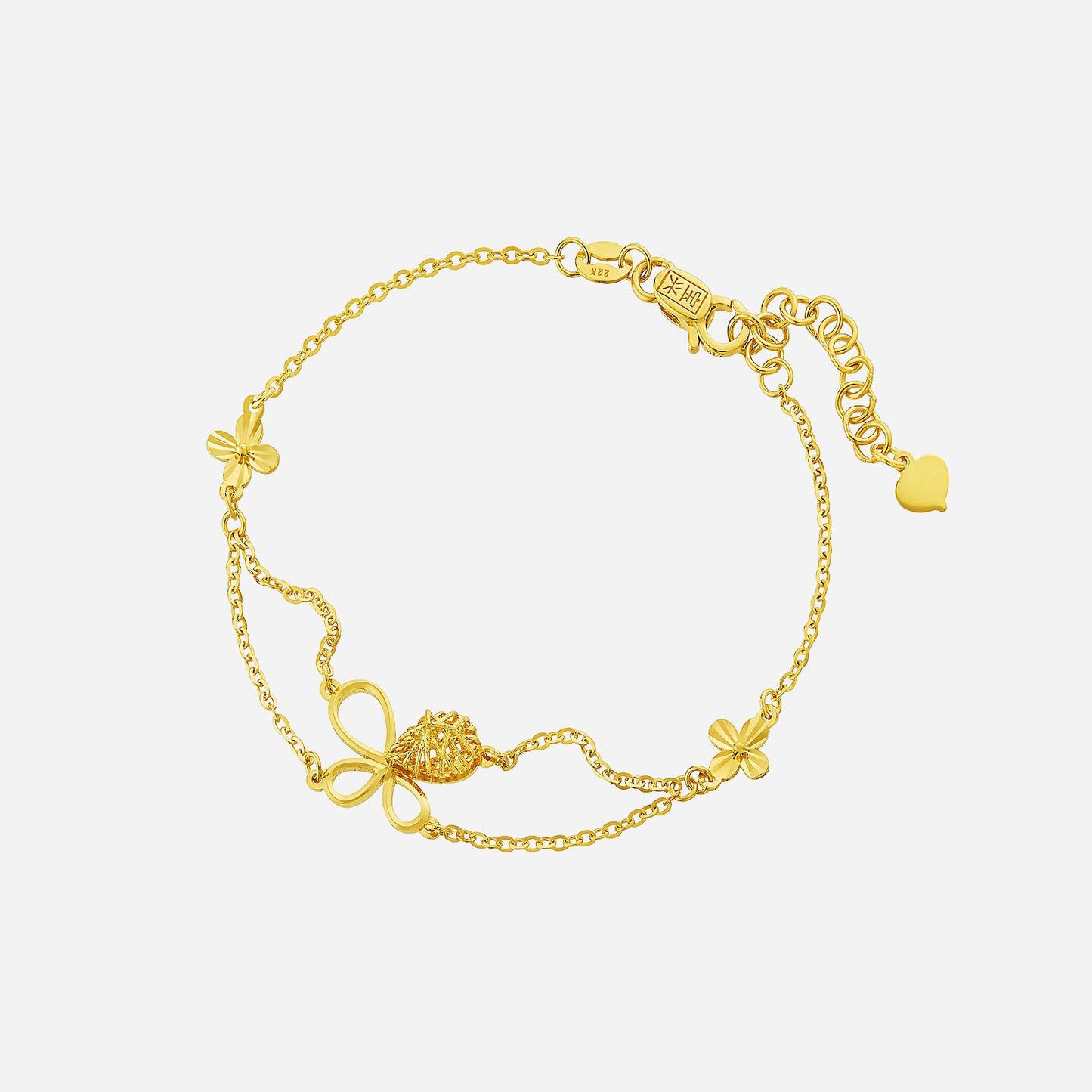 butterfly bracelet in 22k yellow gold featuring floral motifs and a delicate bow design. elegant and charming accessory.