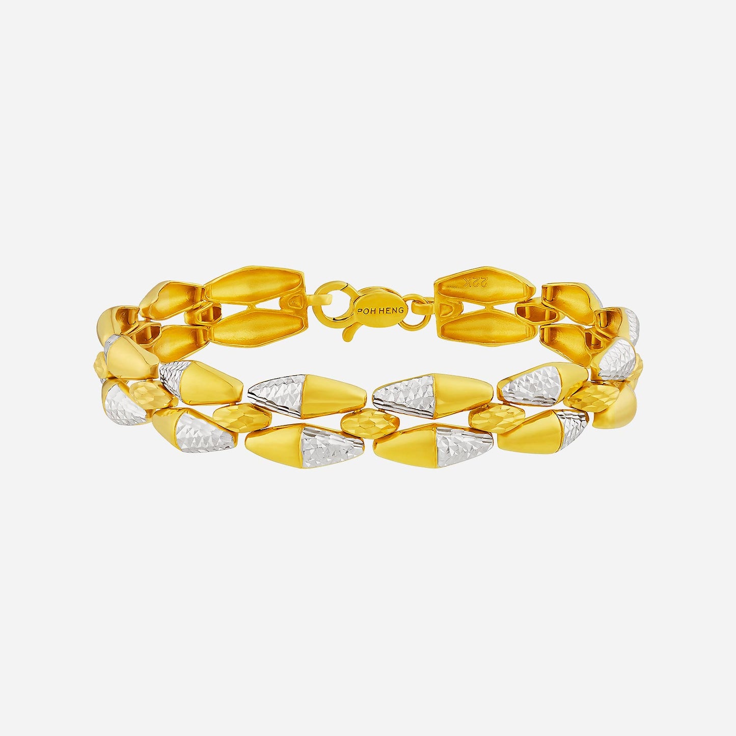 lambent bracelet in 22k yellow and white gold with textured design, featuring alternating polished and diamond-cut links.