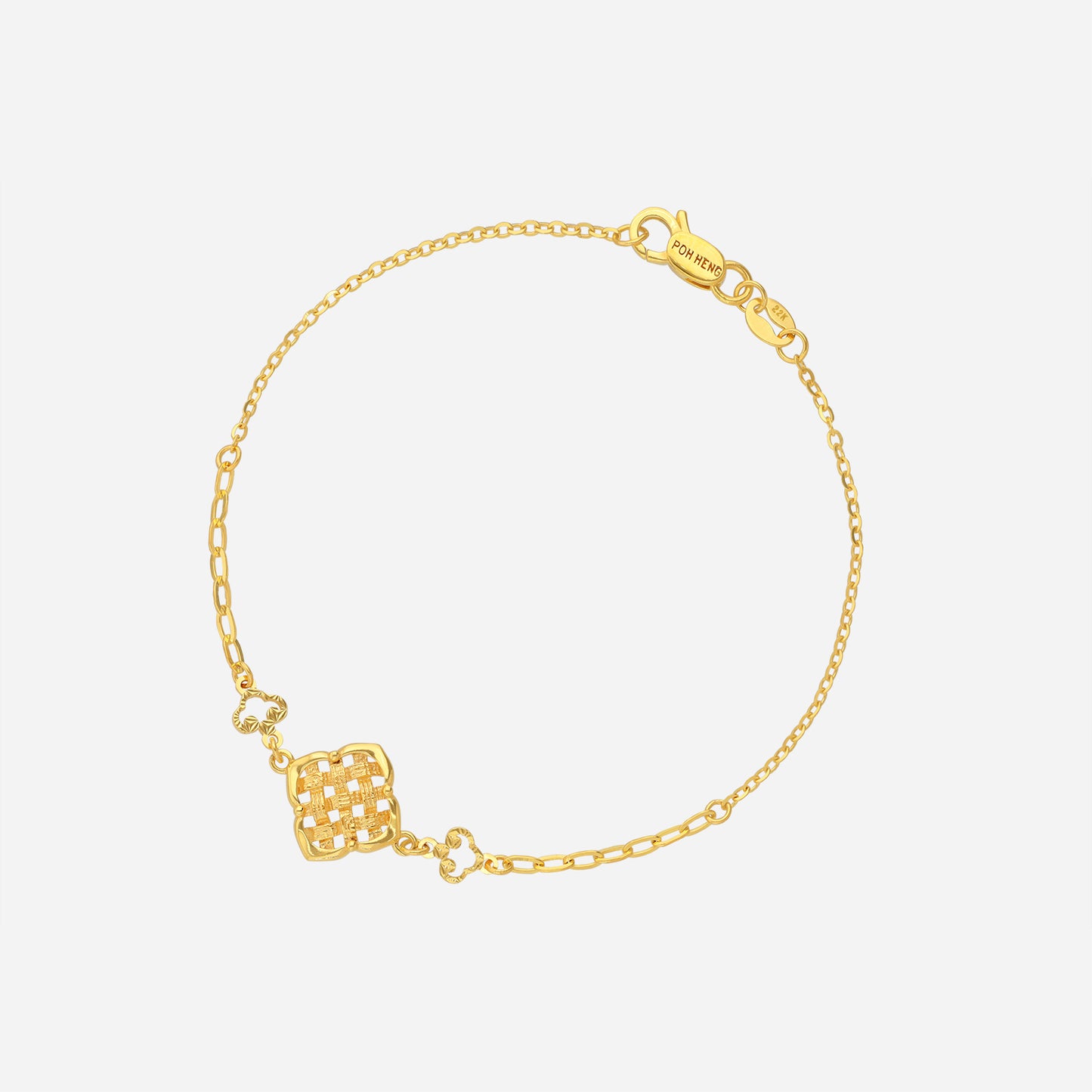 woven embrace bracelet in 22k yellow gold with intricate woven motif and clover-shaped links for stylish elegance.