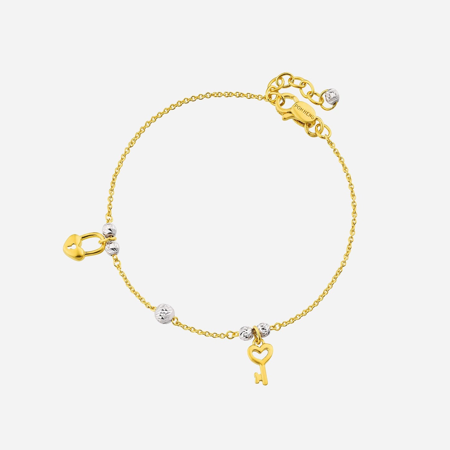key and lock bracelet in 22k yellow and white gold, featuring key and lock charms with minimalist design.