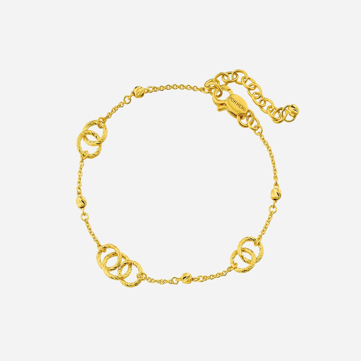 loop bracelet in 22k yellow gold featuring twisted circles, delicate chain links, and a secure clasp closure.