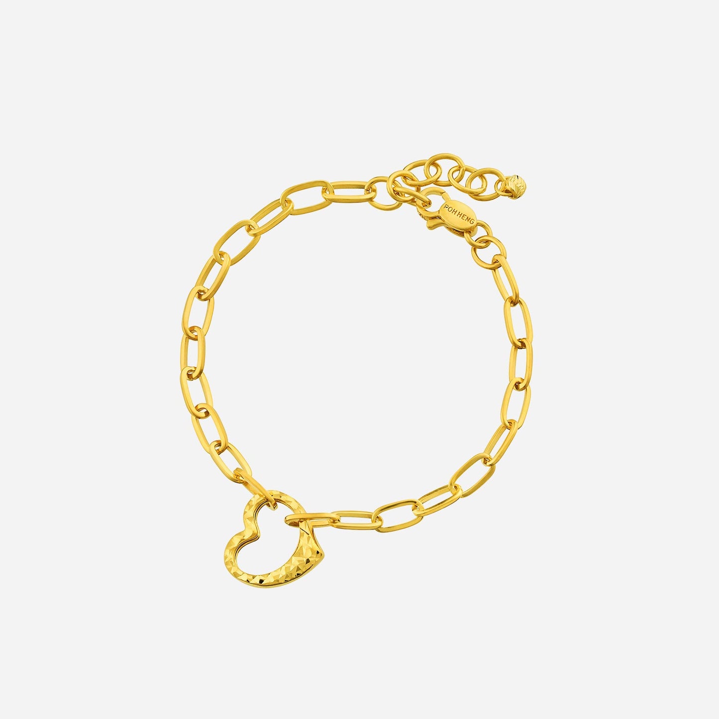 heart bracelet in 22k yellow gold with a delicate belcher chain and hammered heart detail. symbol of love and affection.
