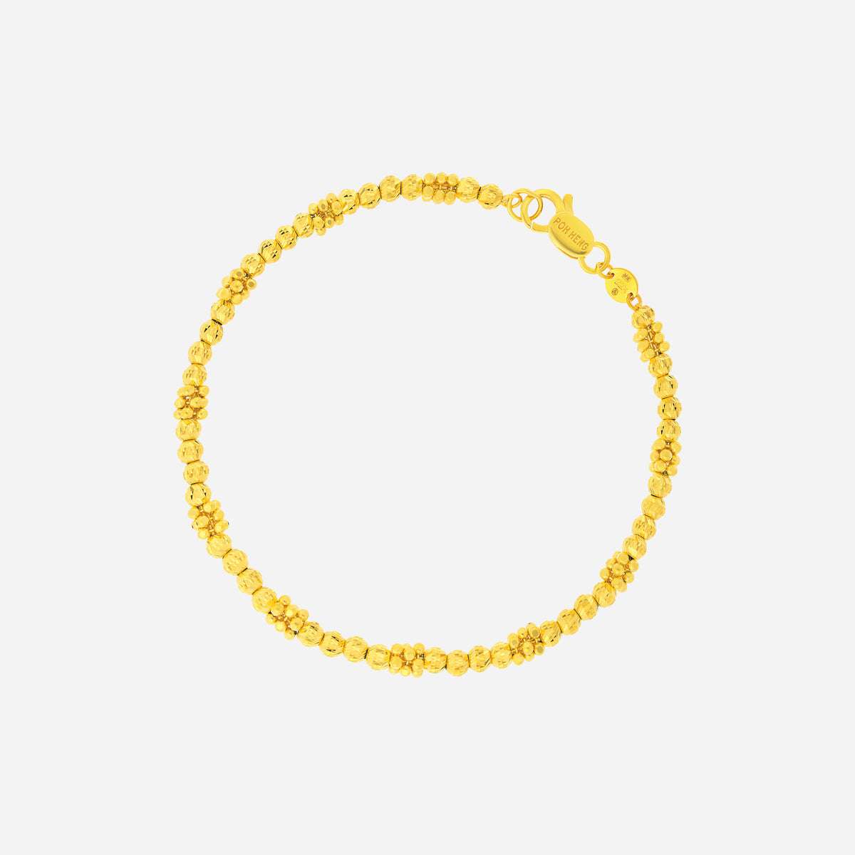 beaded bracelet in 22k yellow gold with textured round and shaped beads, perfect for adding a touch of sunshine to any outfit.
