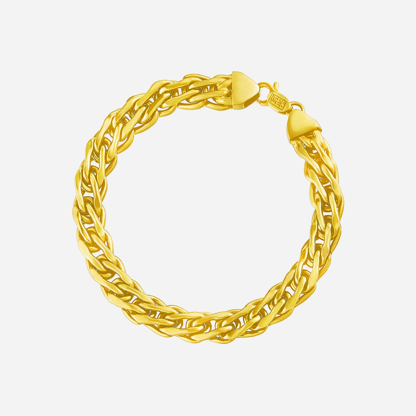 22k yellow gold interlink bracelet featuring bold textures and sleek curves for a contemporary style.