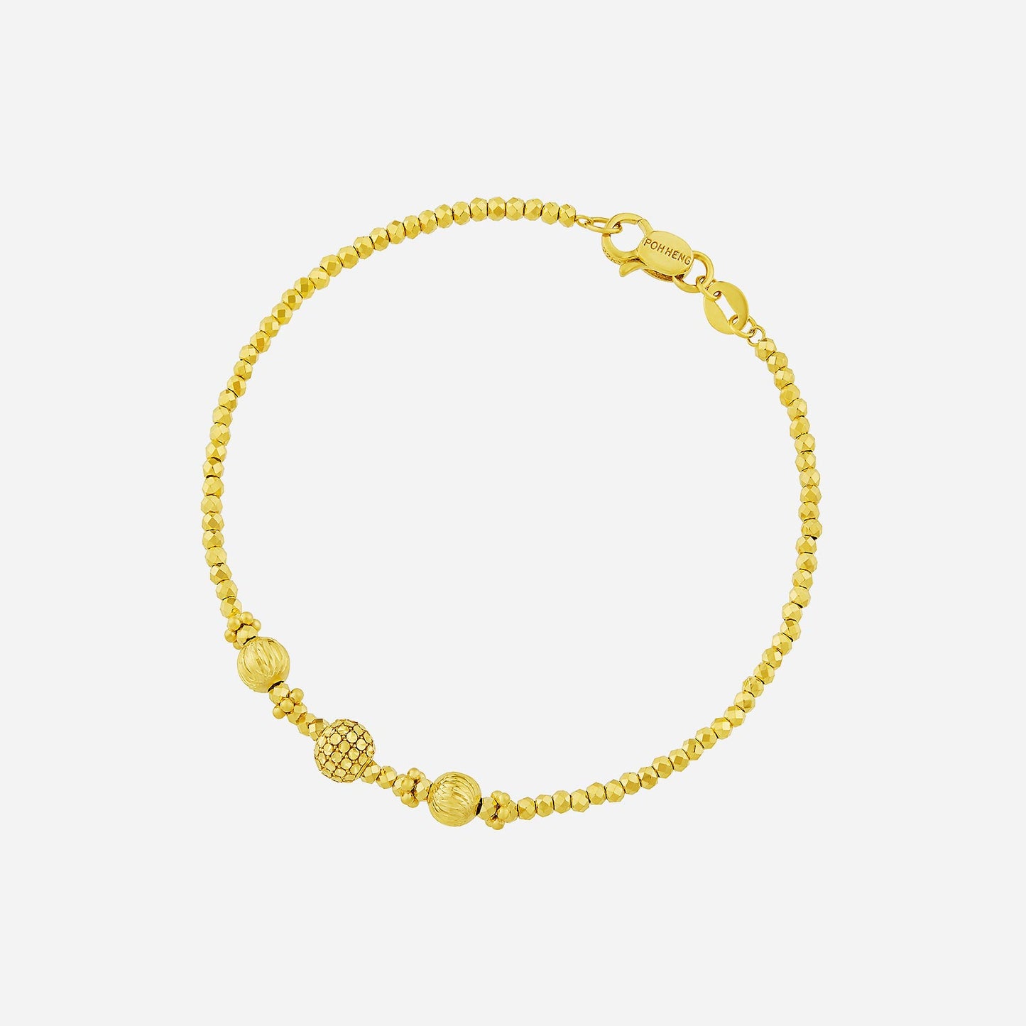 beaded bracelet in 22k yellow gold with three decorative beads for an elegant and charming look.