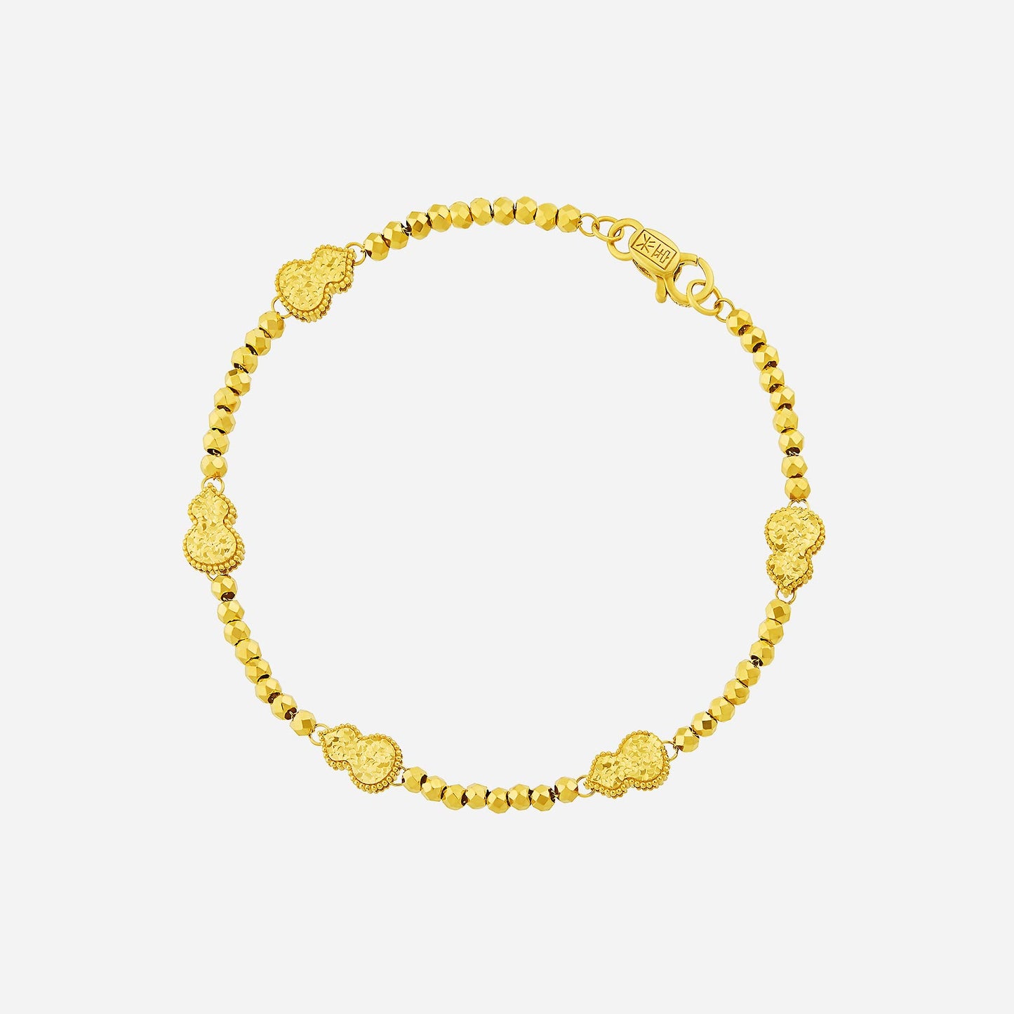 glimmering gourd bracelet in radiant 22k yellow gold with faceted beads and intricate gourd motifs.