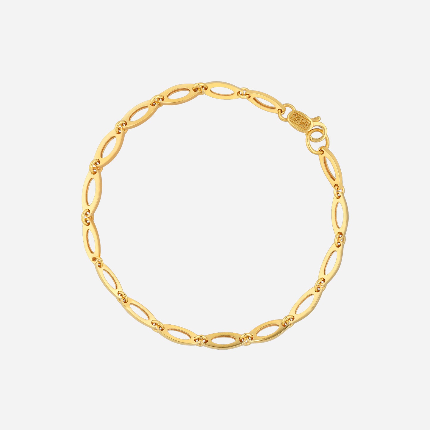 elliptical link bracelet in 22k yellow gold with elongated open links for everyday sophistication.