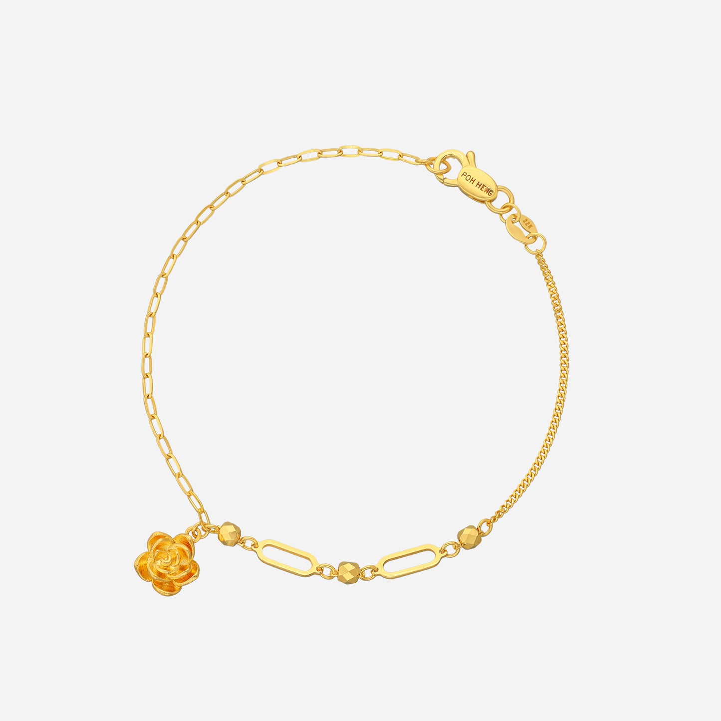 floral medley bracelet in 22k yellow gold with sculpted floral charm and polished beads, showcasing delicate chain design.