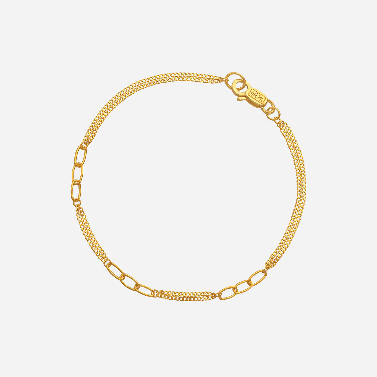 loop link bracelet in 22k yellow gold with finely woven chain and smooth elongated loop links.