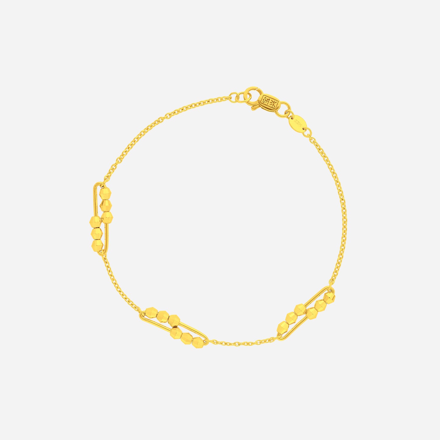 beaded link loop bracelet in 22k yellow gold with sculpted links and fine chain design. perfect for layering.