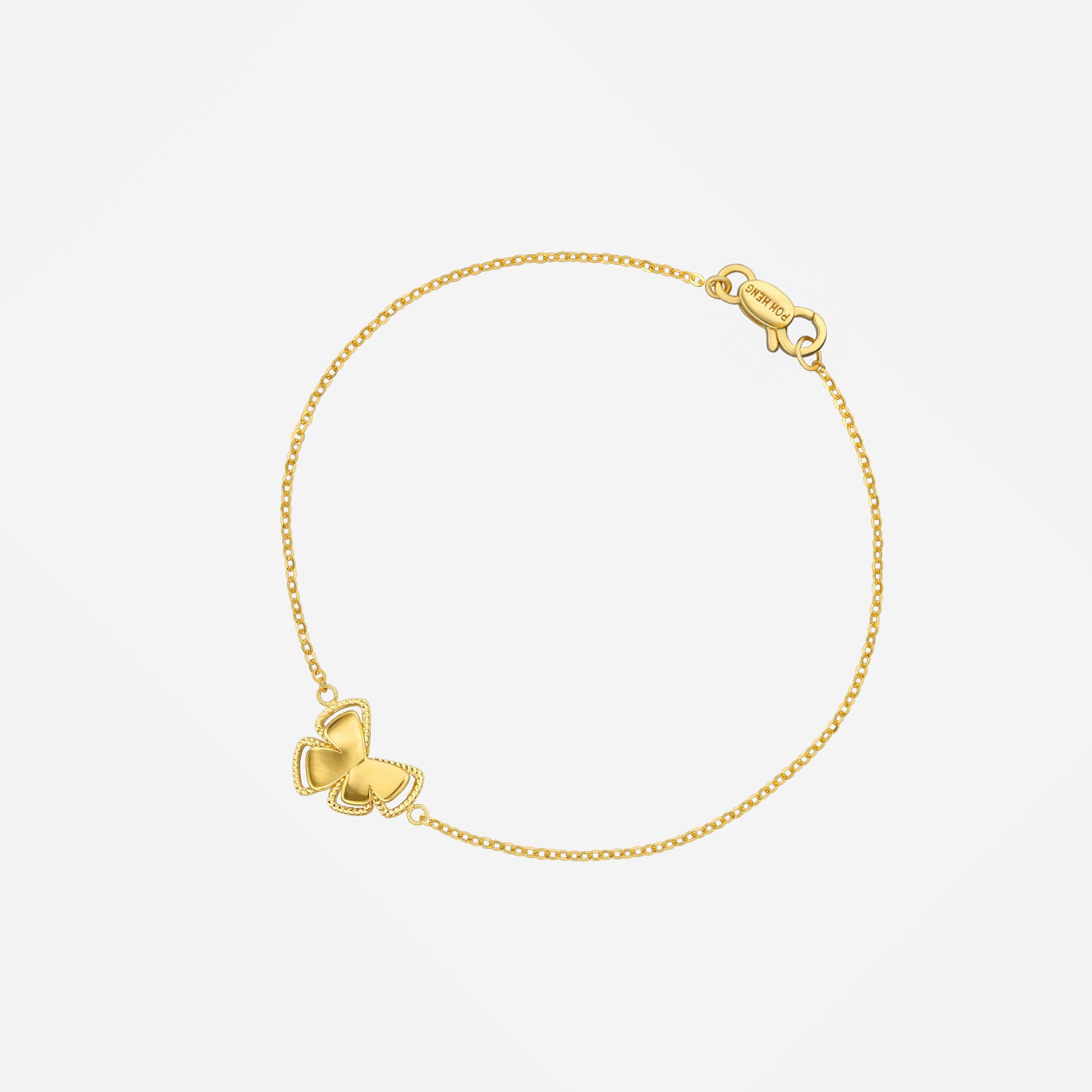 radiant butterfly bracelet in 22k yellow gold with a textured butterfly centerpiece on a delicate chain.