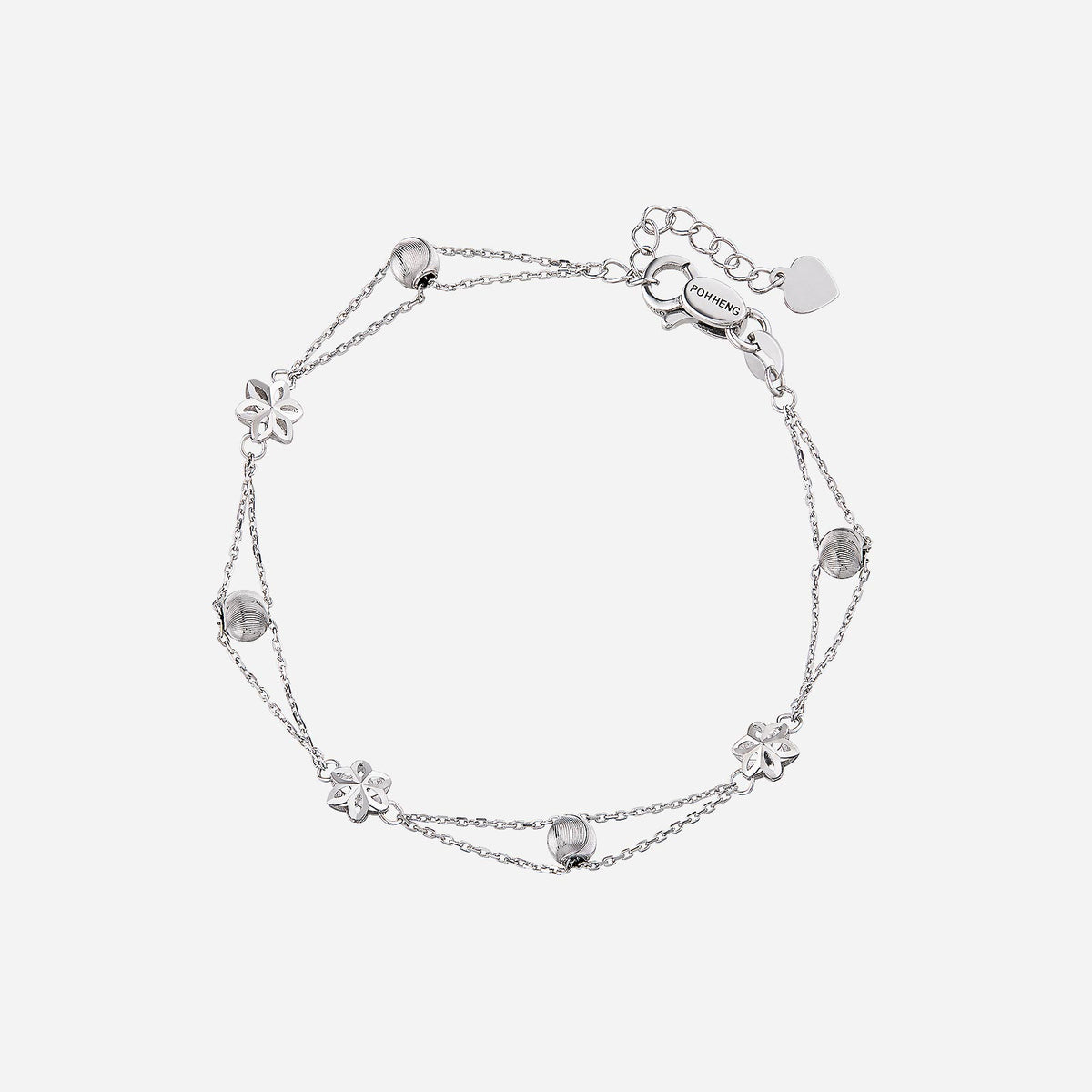 18k white gold bracelet with floral motifs and polished accents, perfect for a delicate springtime look.