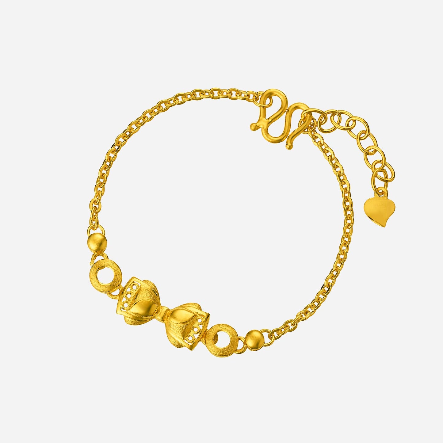 ribbon bracelet in 24k yellow gold with a delicate bow design and circular accents, perfect for elegant styling.