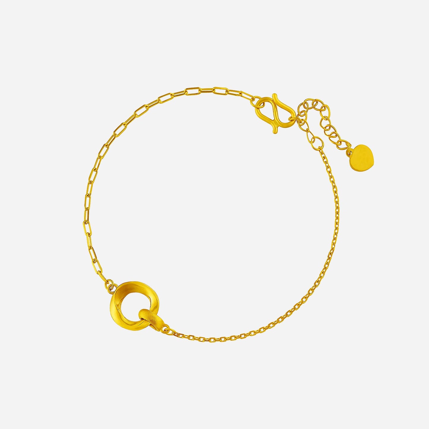 24k yellow gold wave link bracelet featuring a smooth circular charm and a delicate chain design.