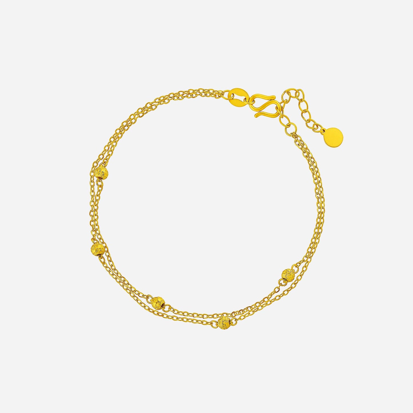 24k yellow gold beaded bracelet with intricate gold beads on a double-chain design, elegantly crafted for sophistication.