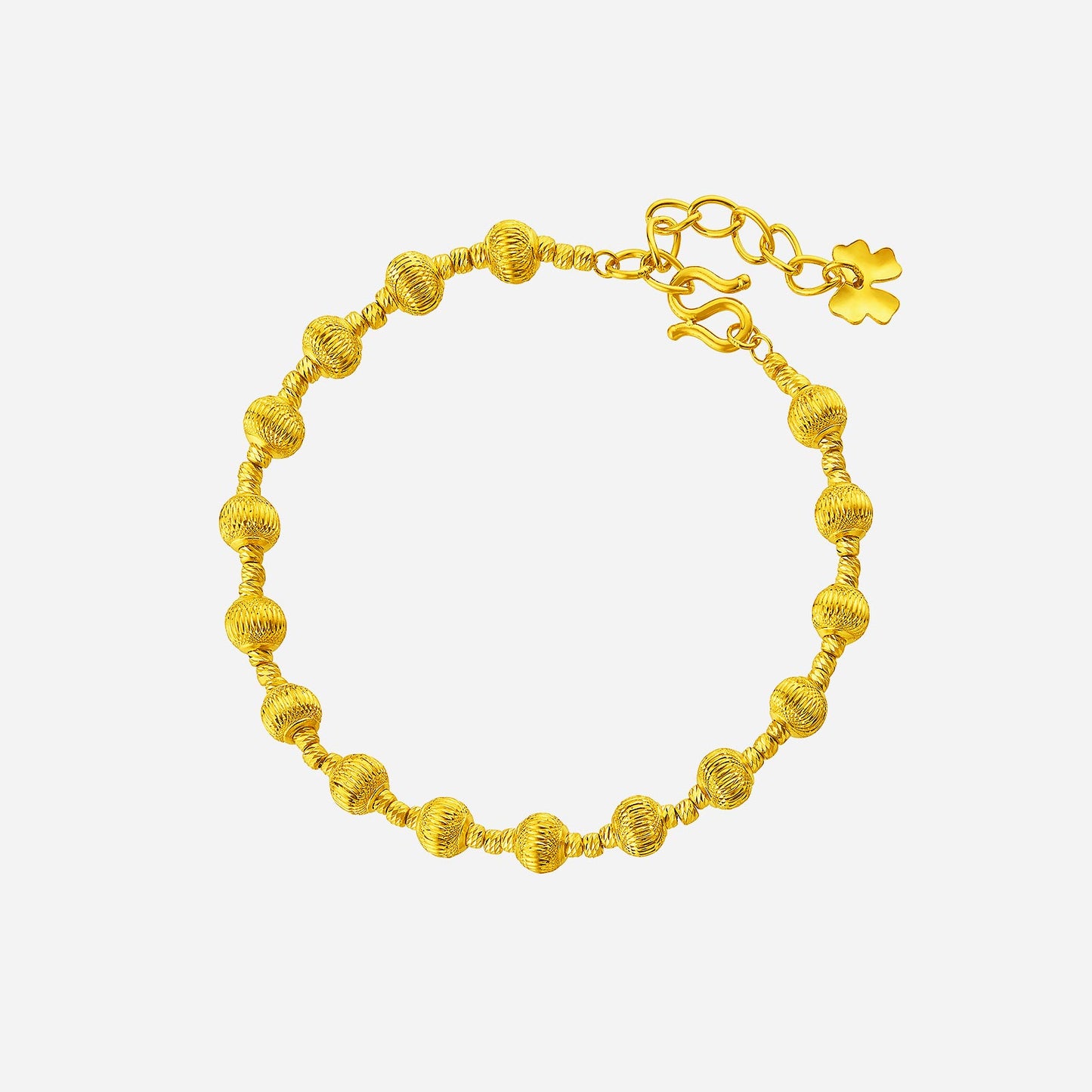 textured beaded bracelet in 22k yellow gold with intricate detailing and a secure clasp, perfect for elegant styling.
