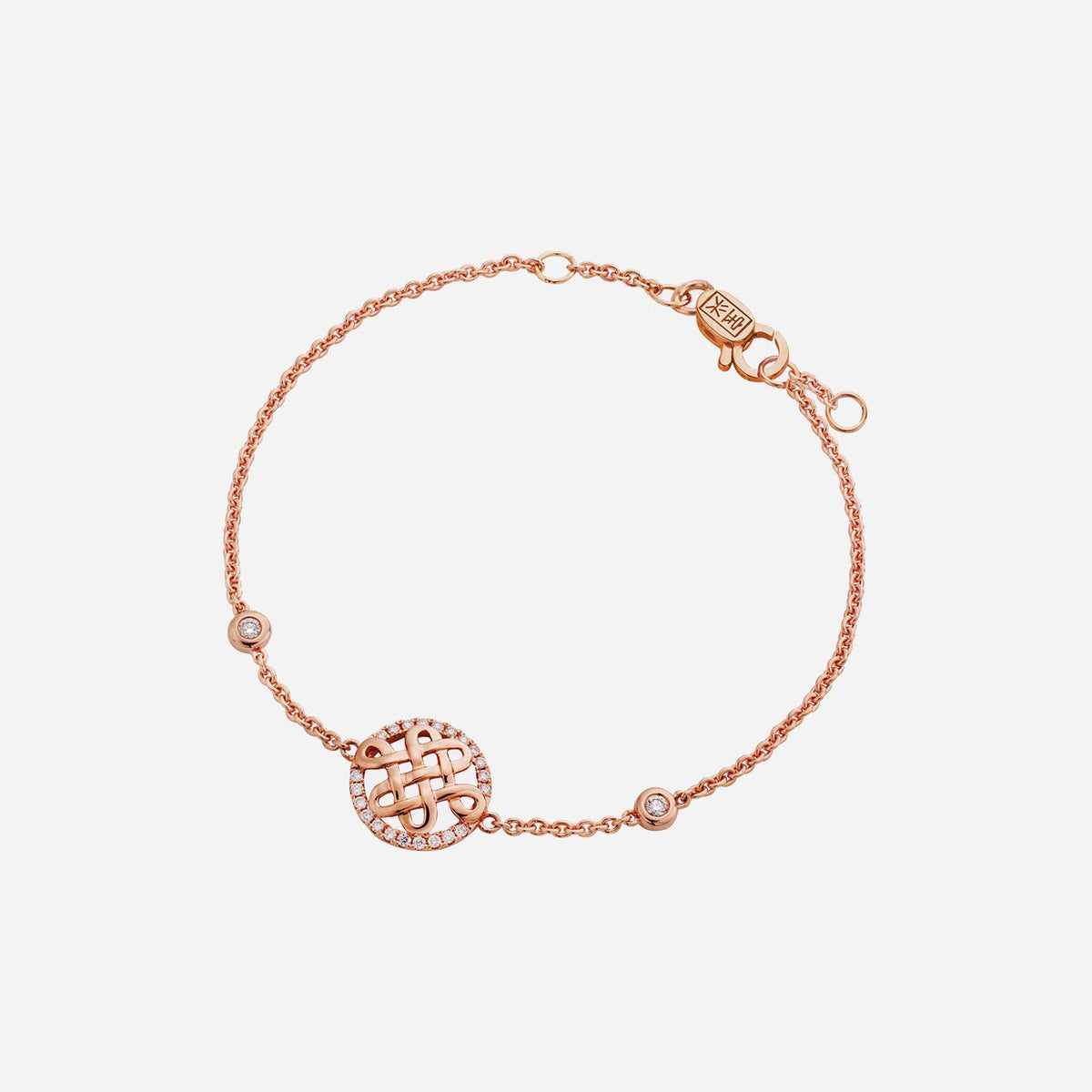 eternity knot diamond bracelet in 18k rose gold with sparkling diamond accents and delicate chain design.
