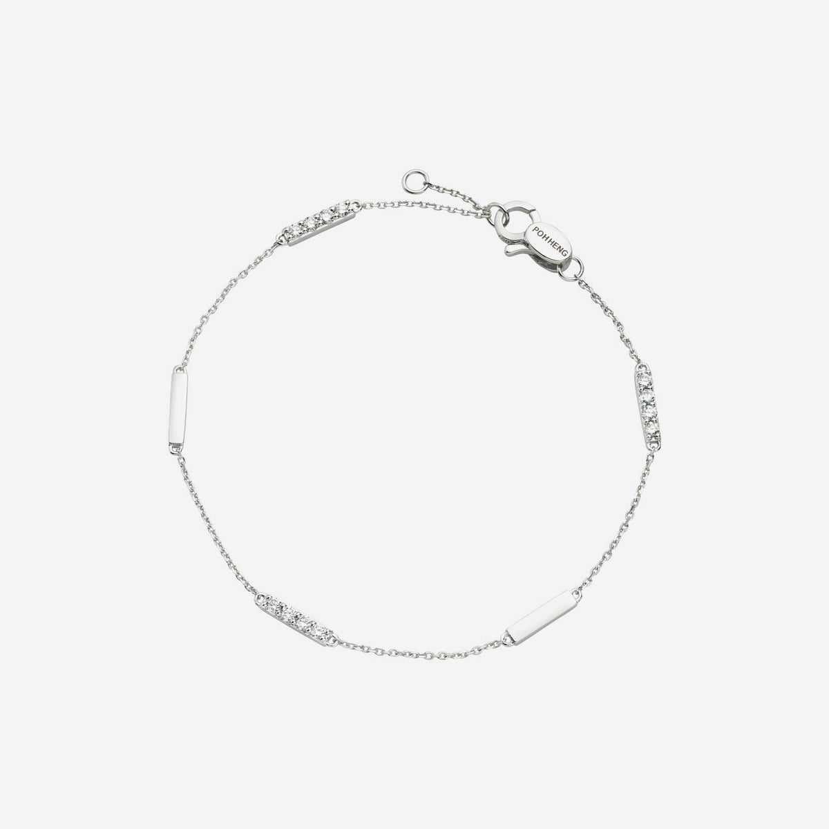 dainty 18k white gold bracelet featuring alternating smooth and diamond-studded bars for an elegant touch.