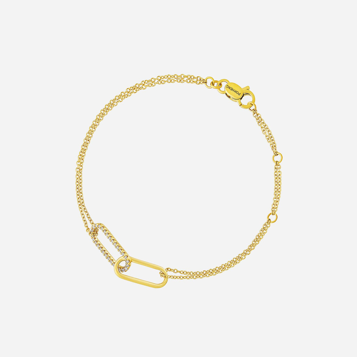harmony of bliss diamond bracelet in 18k yellow gold with polished and pavé twin oval links on a double chain.