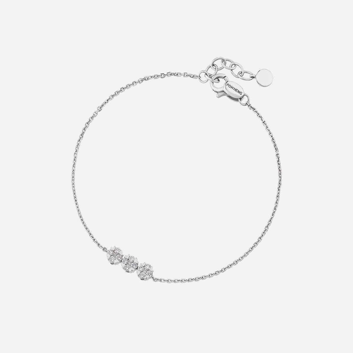sparkle blossom diamond bracelet in 18k white gold with trio floral diamond motifs for a delicate and radiant look.