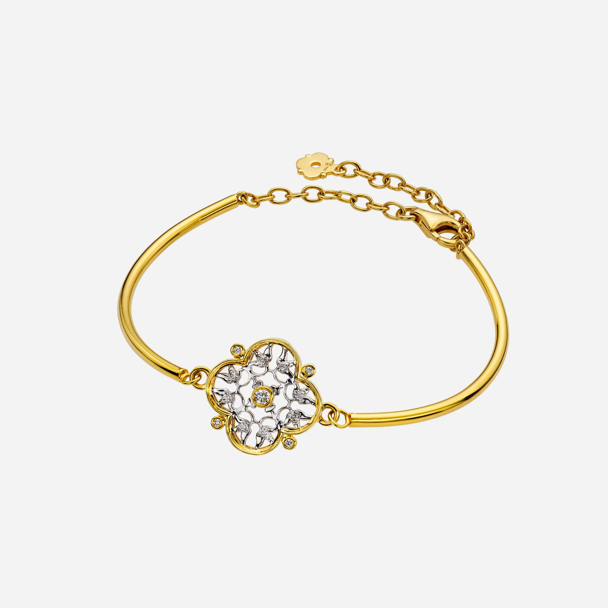 legacy floral bracelet in 18k yellow and white gold, featuring brilliant cut diamonds in intricate design.