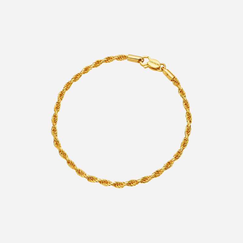 22k yellow gold rope bracelet showcasing a twisted design, perfect for a minimalist look. ideal for stacking or wearing alone.