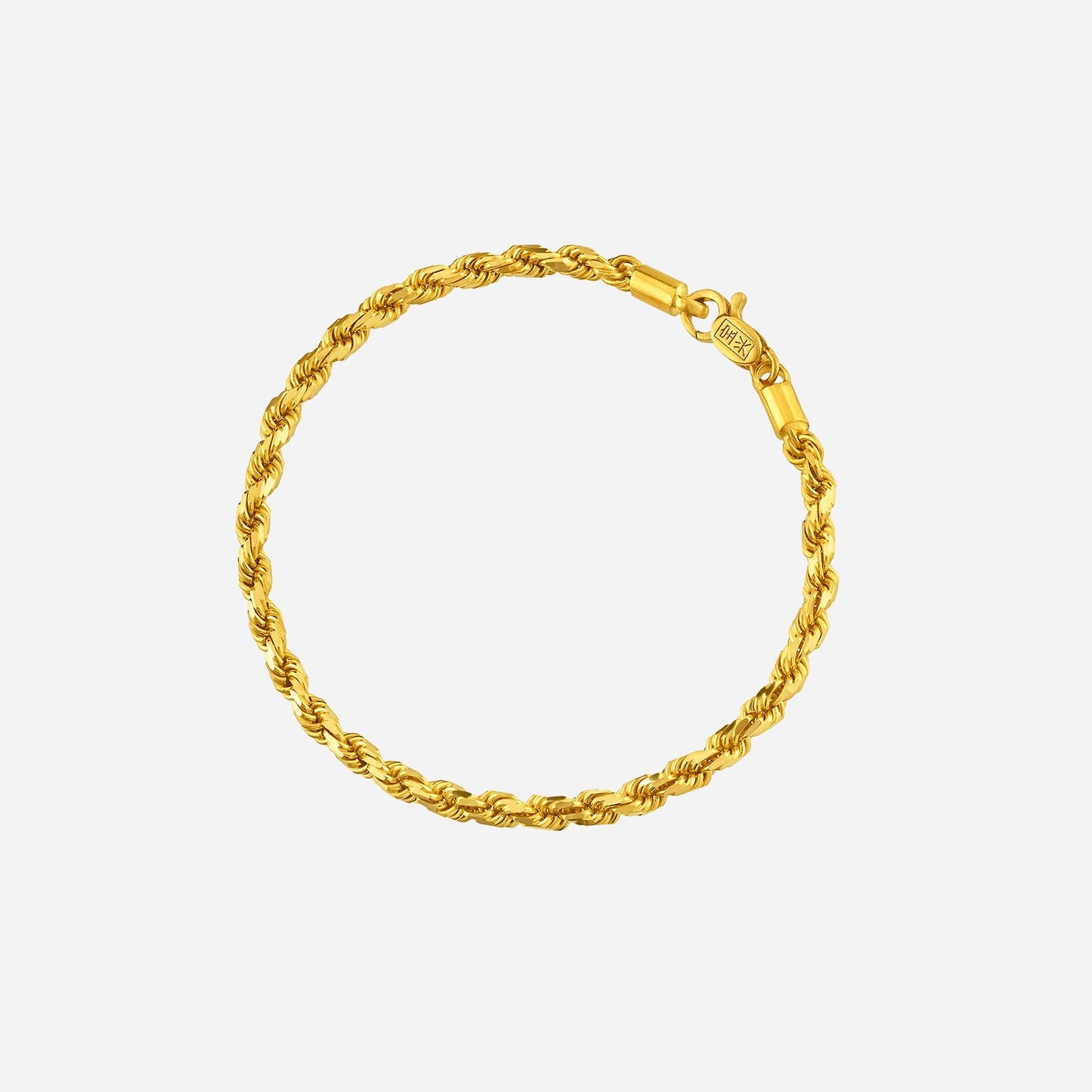 rope bracelet in 22k yellow gold with twisted design, ideal for layering or wearing alone for a chic look.
