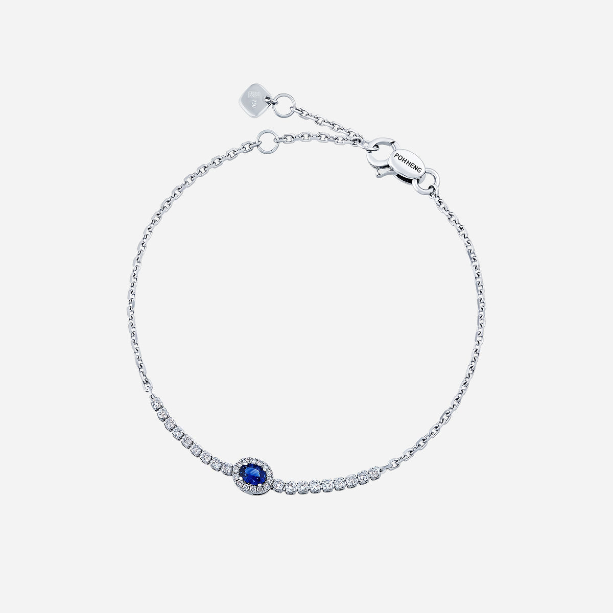 blue sapphire bracelet with diamond accents, set in 18k white gold, featuring a delicate chain and oval gemstone.