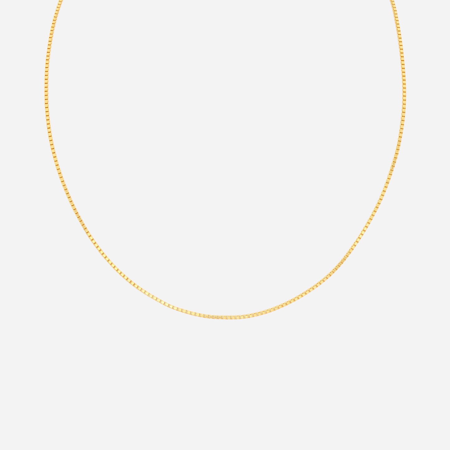 box chain necklace in 22k yellow gold with small square links, perfect for layering or wearing alone.