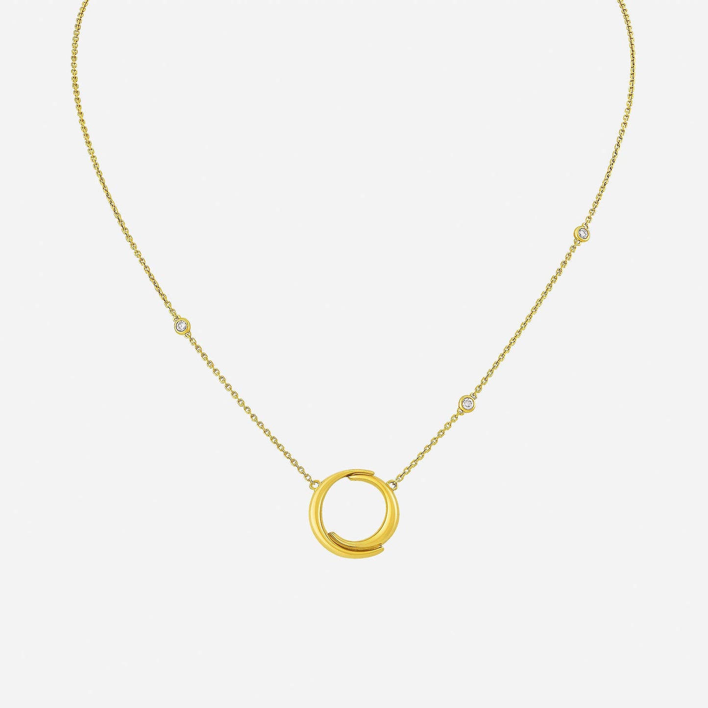 venus diamond necklace in 22k yellow gold with a diamond-accented circle pendant and delicate chain design.